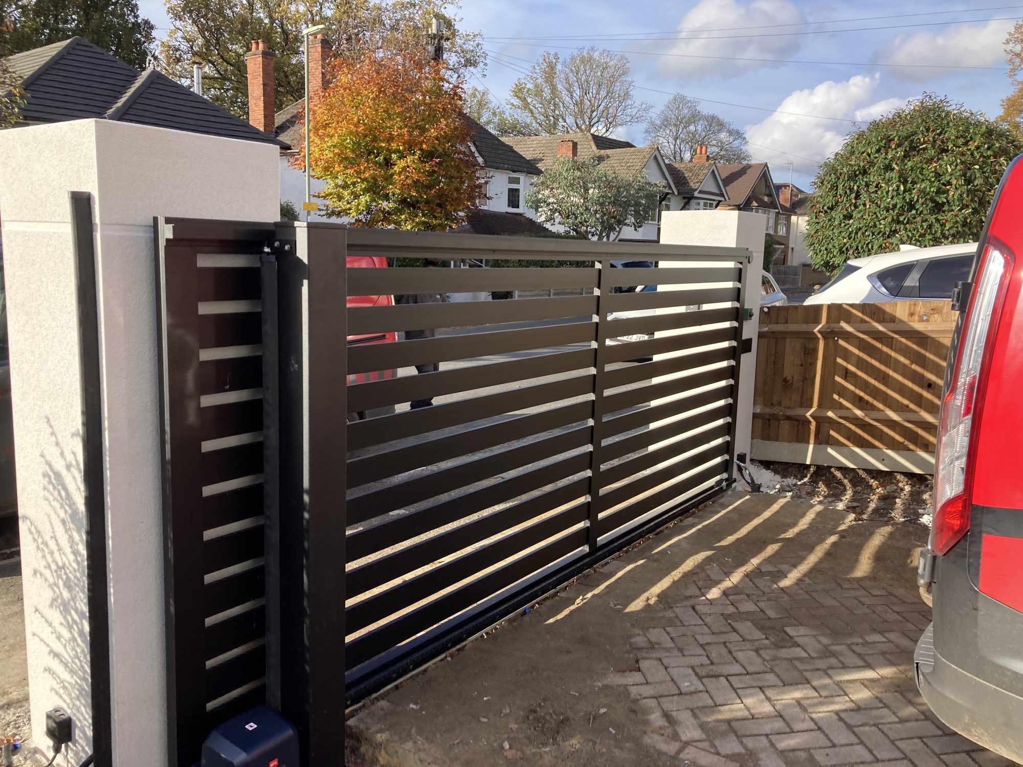 Contemporary slatted sliding gate, Lindfield